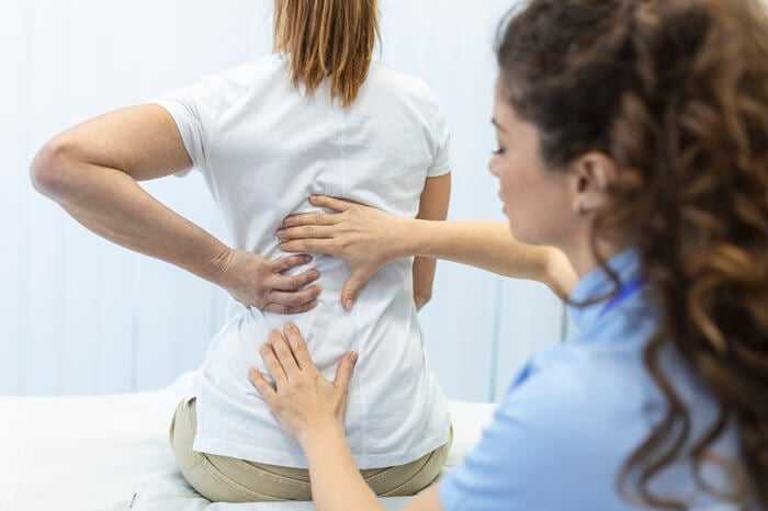 Degenerative disc disease chiropractic care at Axis Health and Wellness in Centennial CO